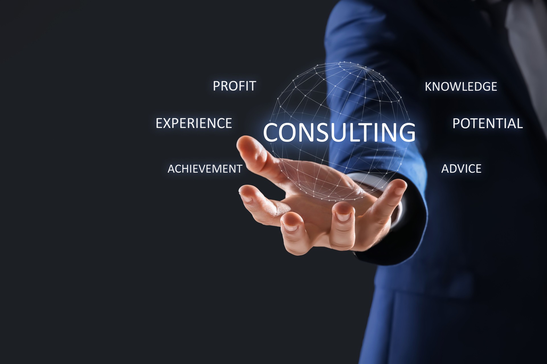 Consulting. Businessman using digital screen on dark background, closeup